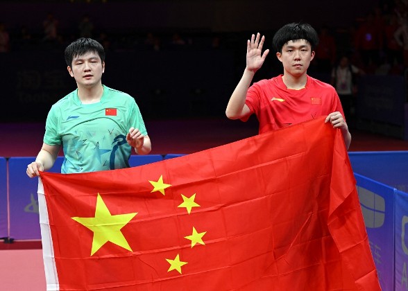 王楚欽（右）今屆乒乓球項目擸4金。©AFP