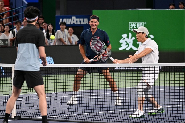 費達拿之前在上海也打表演賽夥拍甄子丹。©AFP