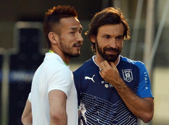 中田英壽（左）認為日本隊在今屆世界盃的過程比結果更為重要。©AFP